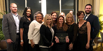 Group photo of Spine Hospital Nurses accepting 2019 LNF Hospital of the Year Award (